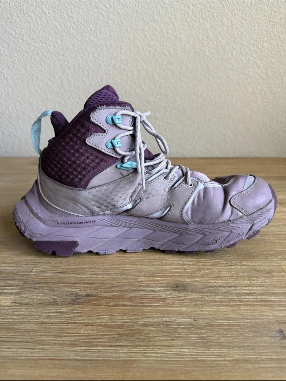 Hoka Lavender and Deep Purple High-Top Trail Sneakers